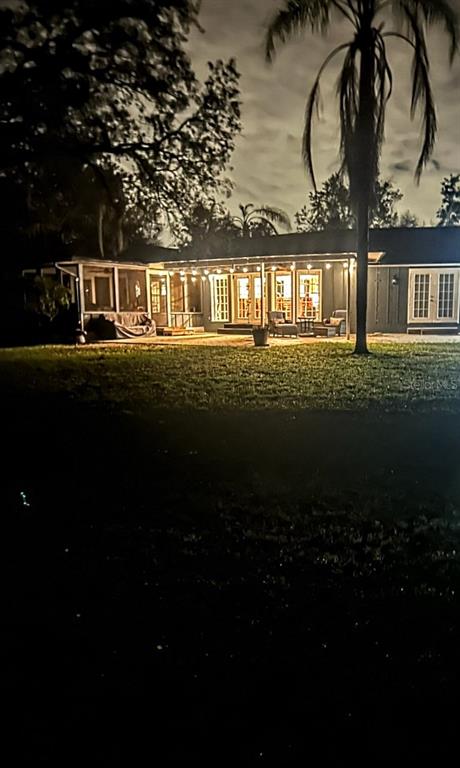 13 Gracie Road DeBary, FL 32713 - Photo 48 of 53 a front view of a house with a garden