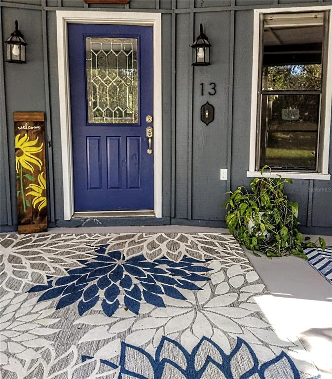 13 Gracie Road DeBary, FL 32713 - Photo 5 of 53 a front view of a house with entryway