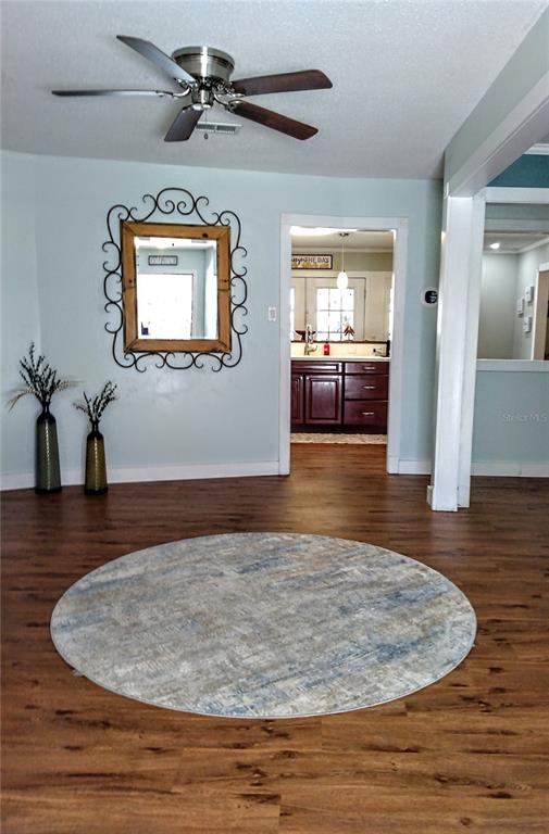 13 Gracie Road DeBary, FL 32713 - Photo 7 of 53 a view of a livingroom with wooden floor
