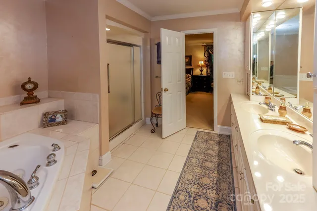 a group of people sitting in a room with clothes