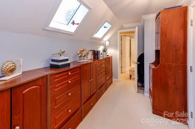 a aerial view of a house with a yard and sitting area