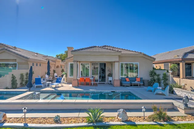 a view of a house with a swimming pool