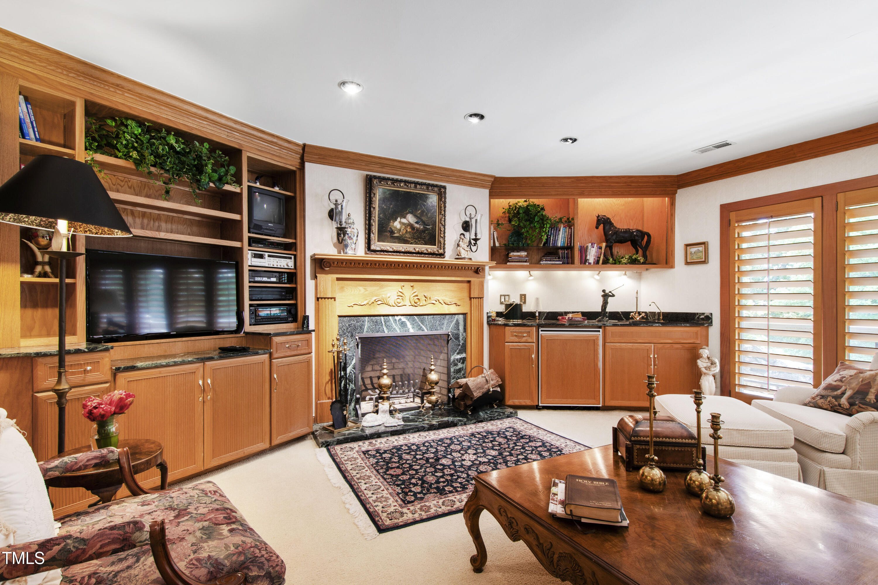 812 Kenmore Road Chapel Hill, NC 27514 - Photo 17 of 95 a living room with furniture and a fireplace