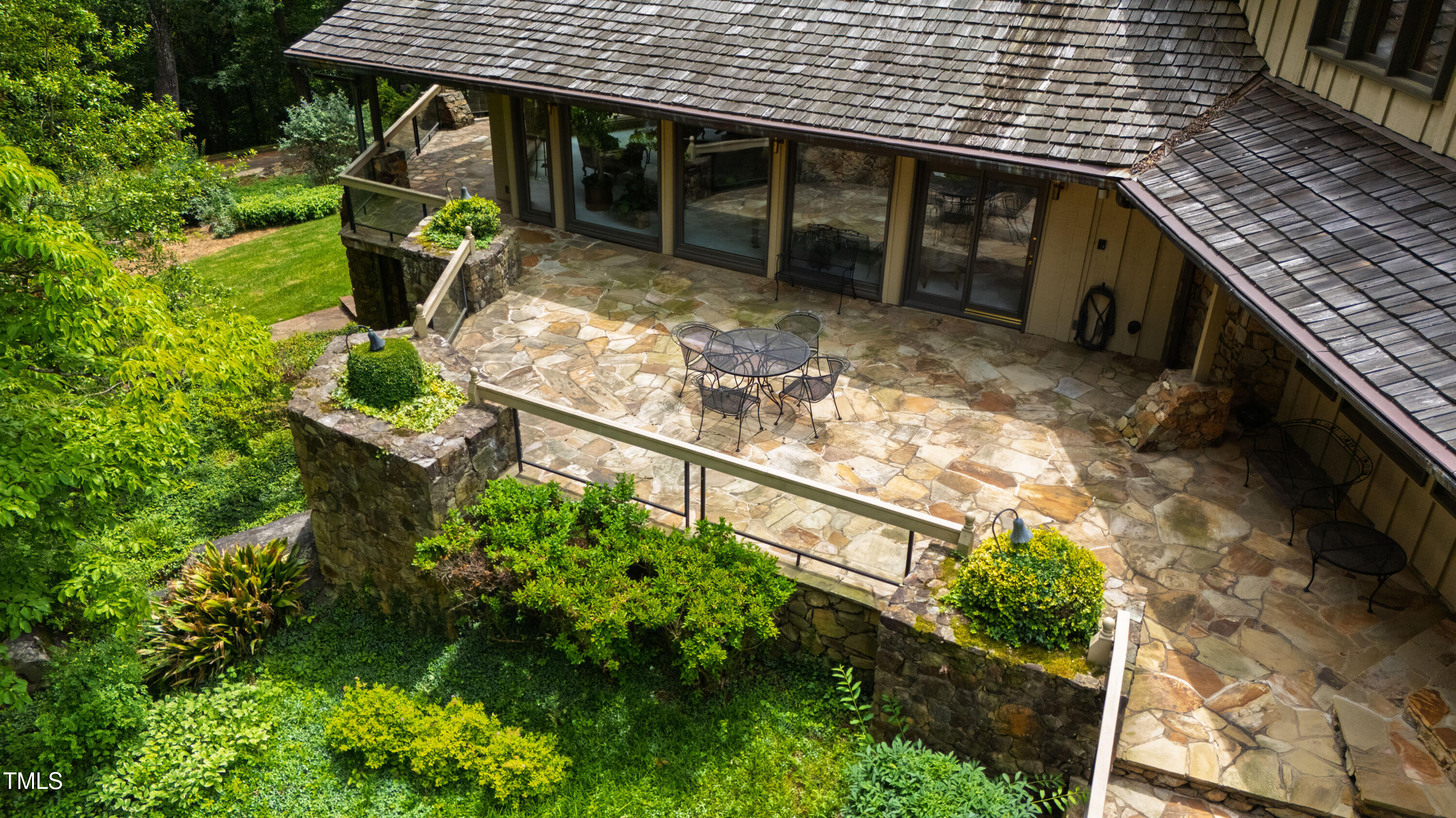 812 Kenmore Road Chapel Hill, NC 27514 - Photo 18 of 95 a view of a house with a garden