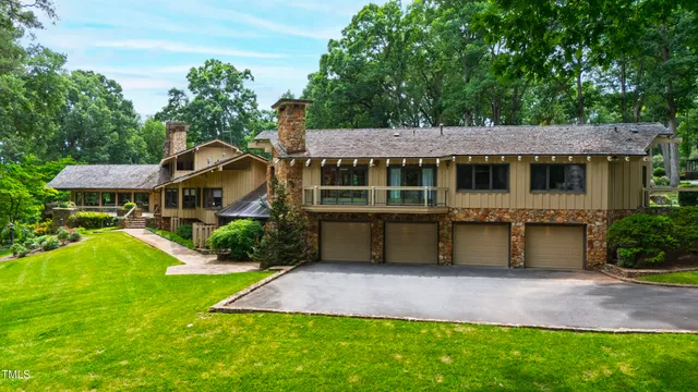 a bathroom with a double vanity sink mirror and shower