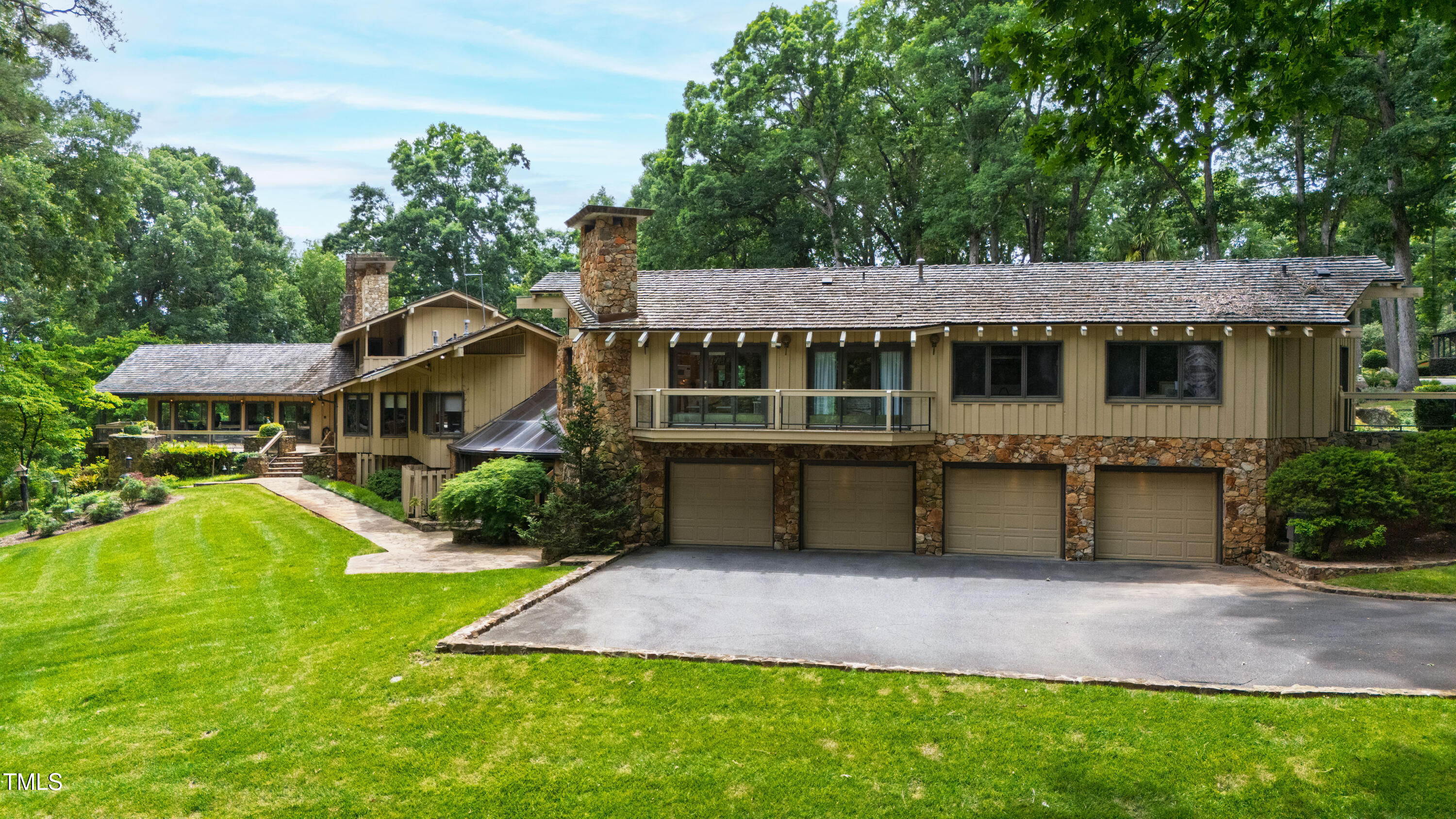 812 Kenmore Road Chapel Hill, NC 27514 - Photo 20 of 95 a front view of a house with a yard