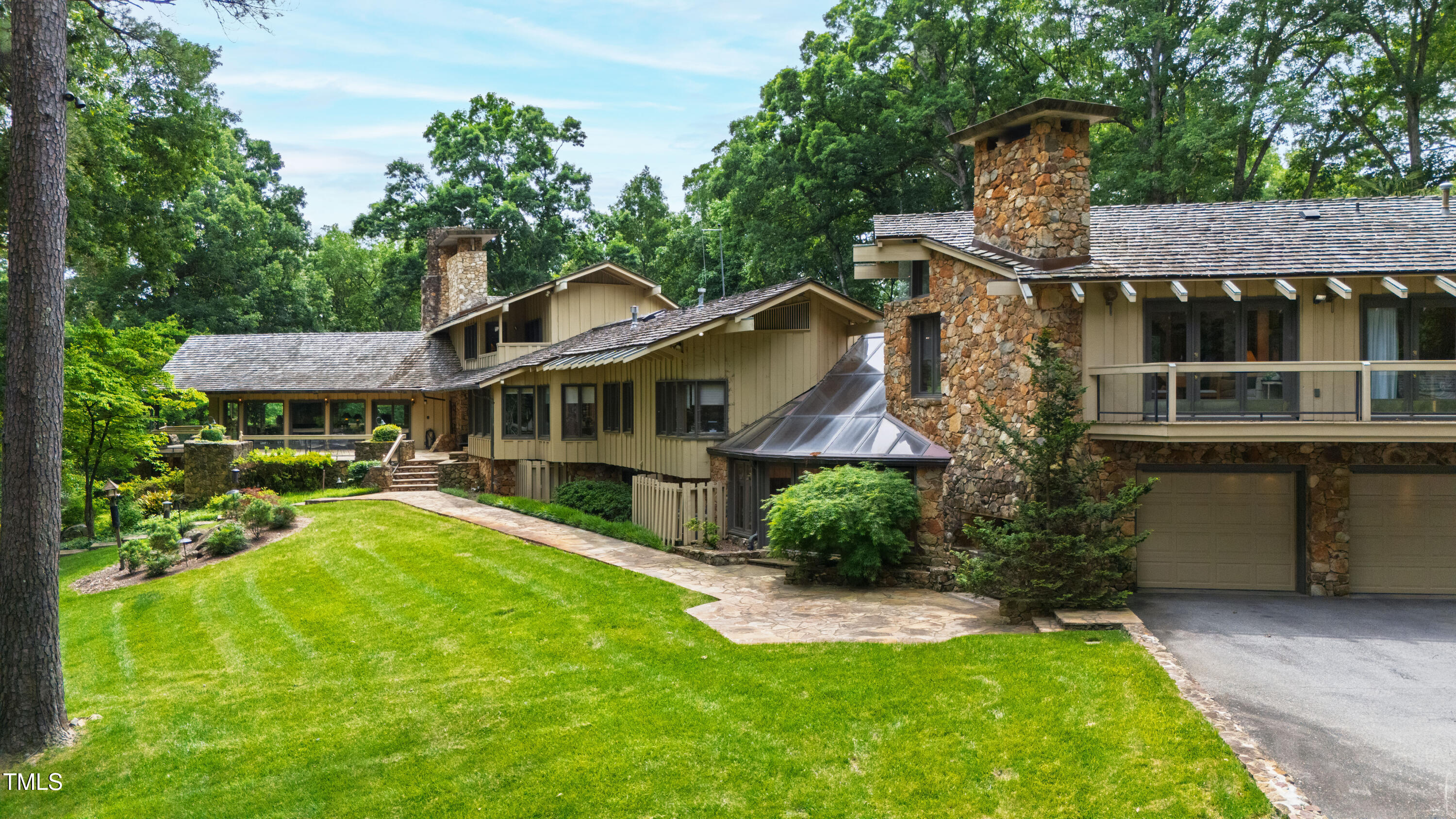 812 Kenmore Road Chapel Hill, NC 27514 - Photo 21 of 95 a front view of a house with swimming pool having outdoor seating