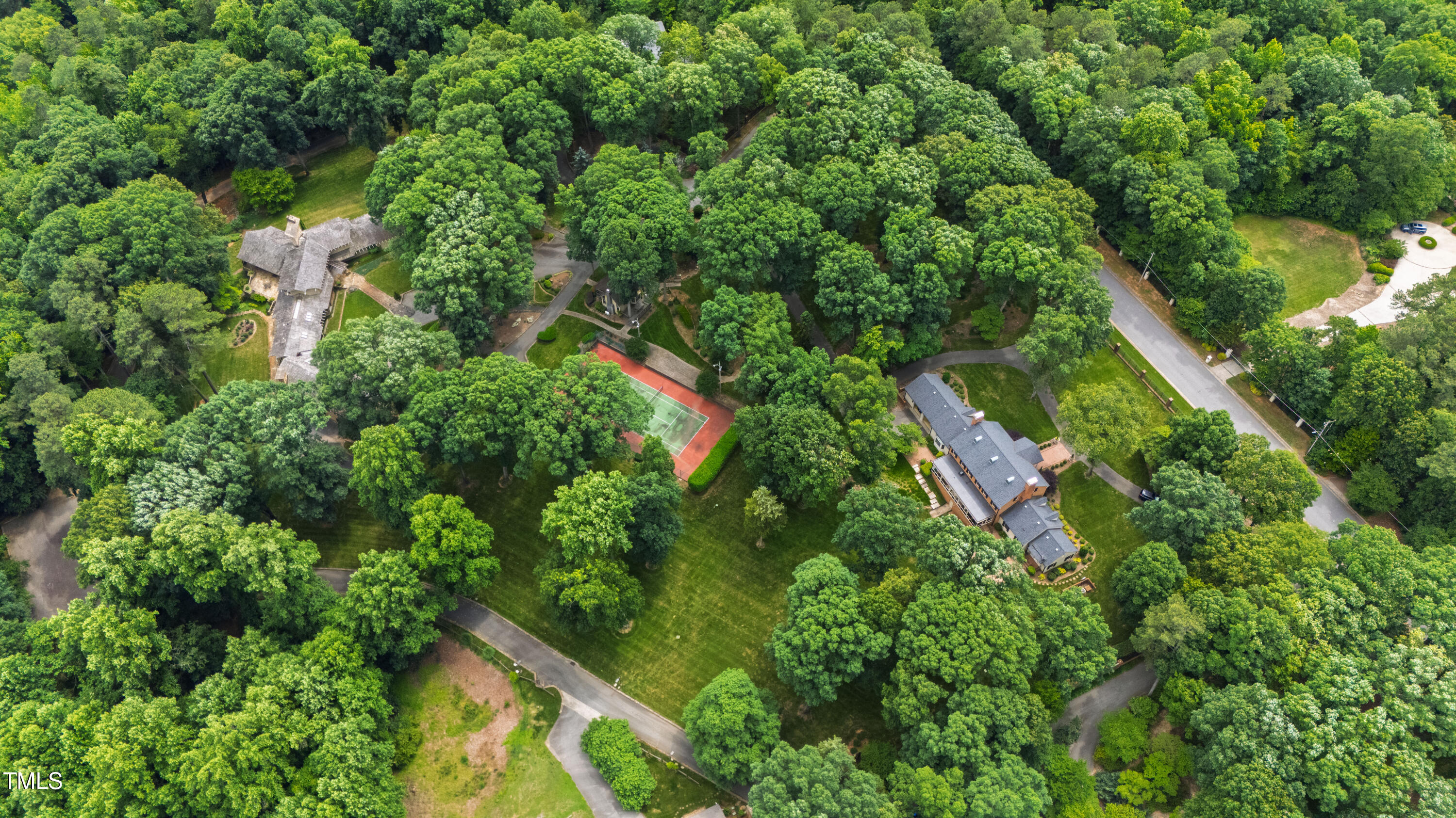 812 Kenmore Road Chapel Hill, NC 27514 - Photo 27 of 95 an aerial view of residential house with outdoor space and trees all around