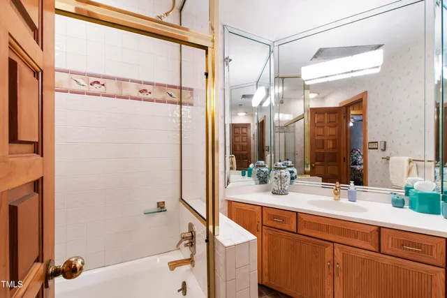 a view of a porch with furniture and a yard
