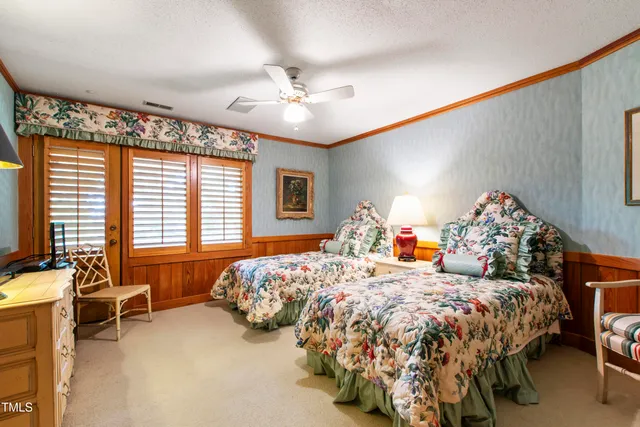a view of a chairs and table in a patio