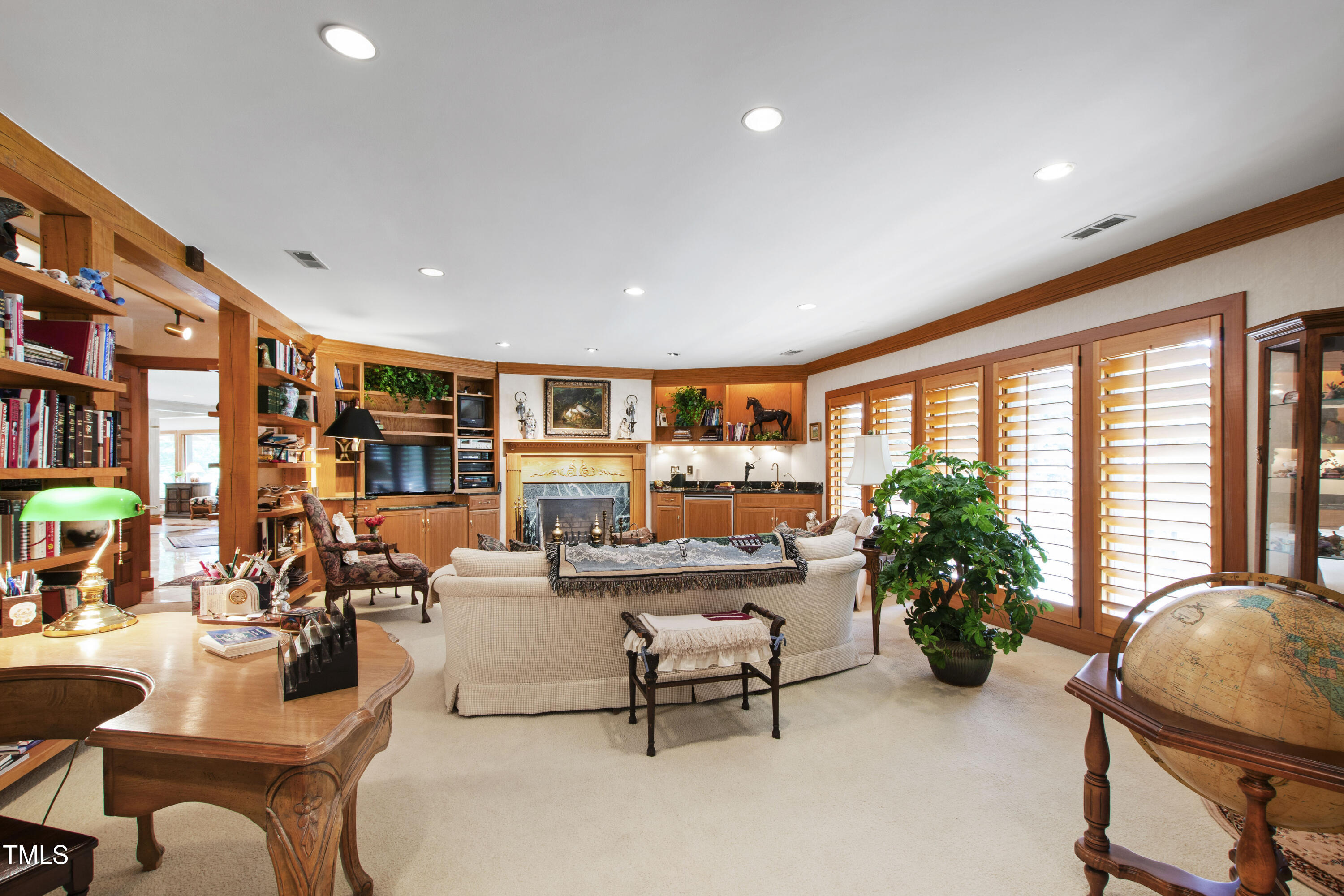 812 Kenmore Road Chapel Hill, NC 27514 - Photo 42 of 95 a living room with furniture and a potted plant