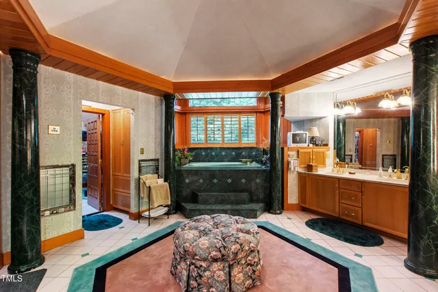 a view of a house with a yard porch and sitting area