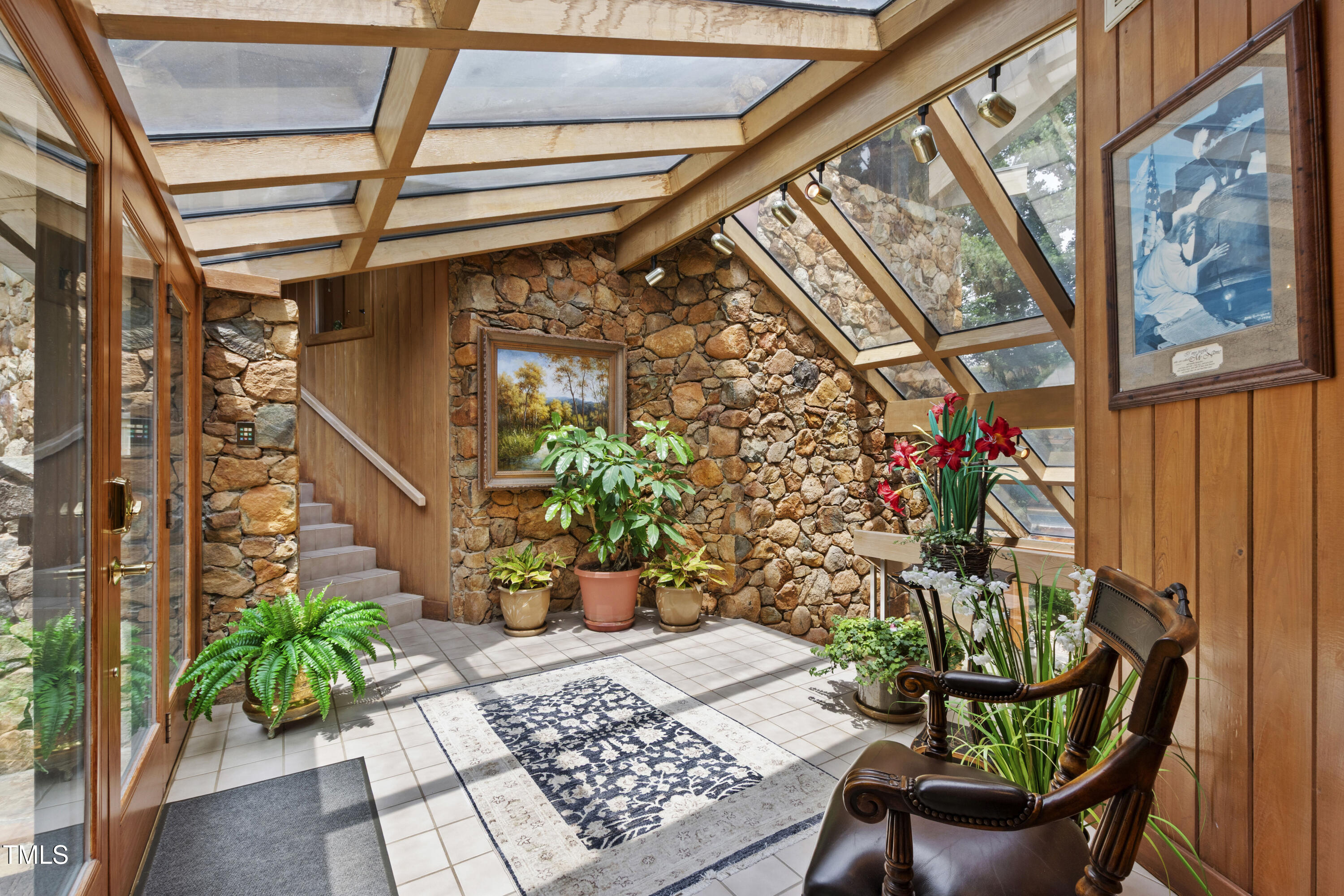 812 Kenmore Road Chapel Hill, NC 27514 - Photo 70 of 95 a view of a chairs and table in a patio