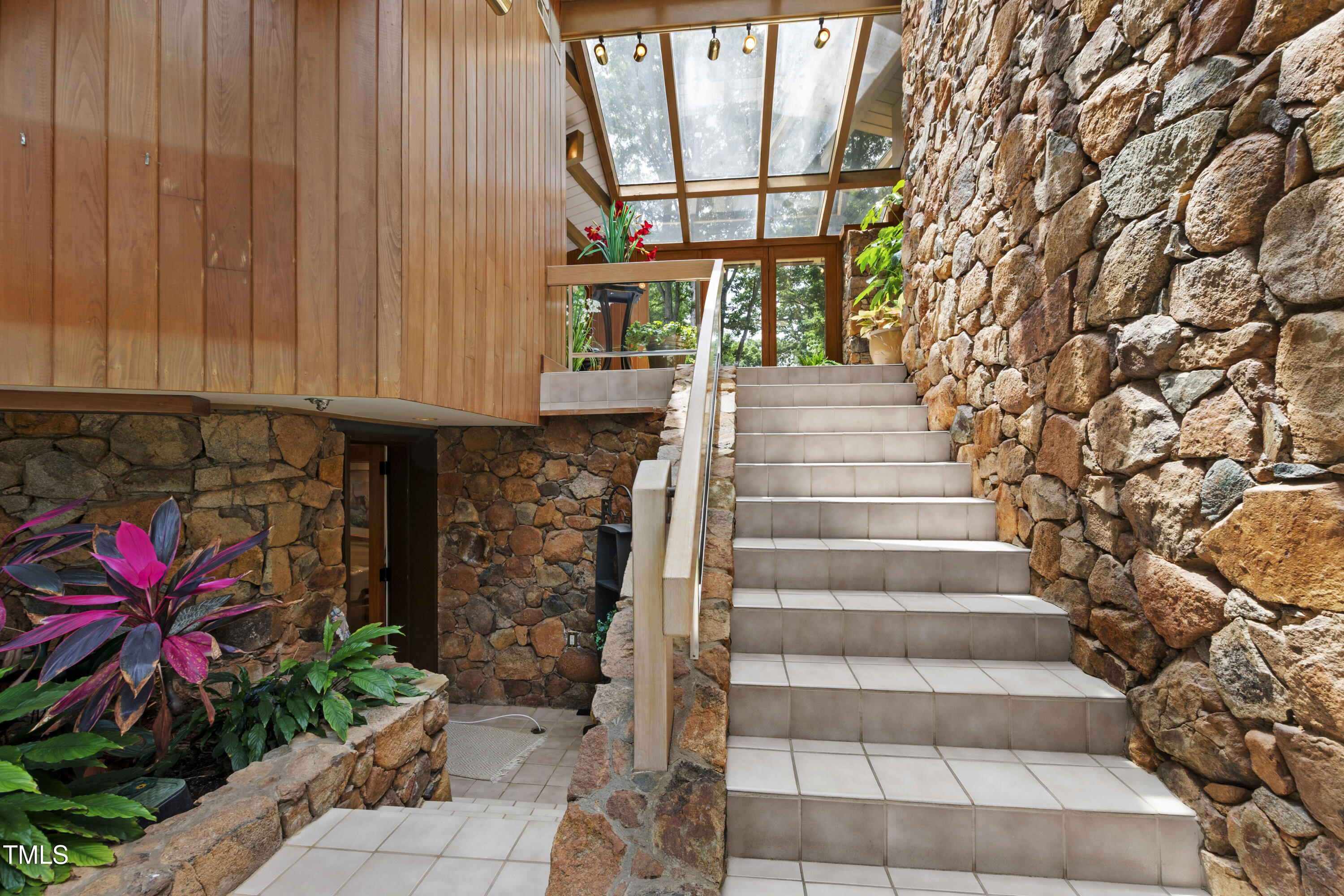 812 Kenmore Road Chapel Hill, NC 27514 - Photo 73 of 95 a view of entryway with flower pots