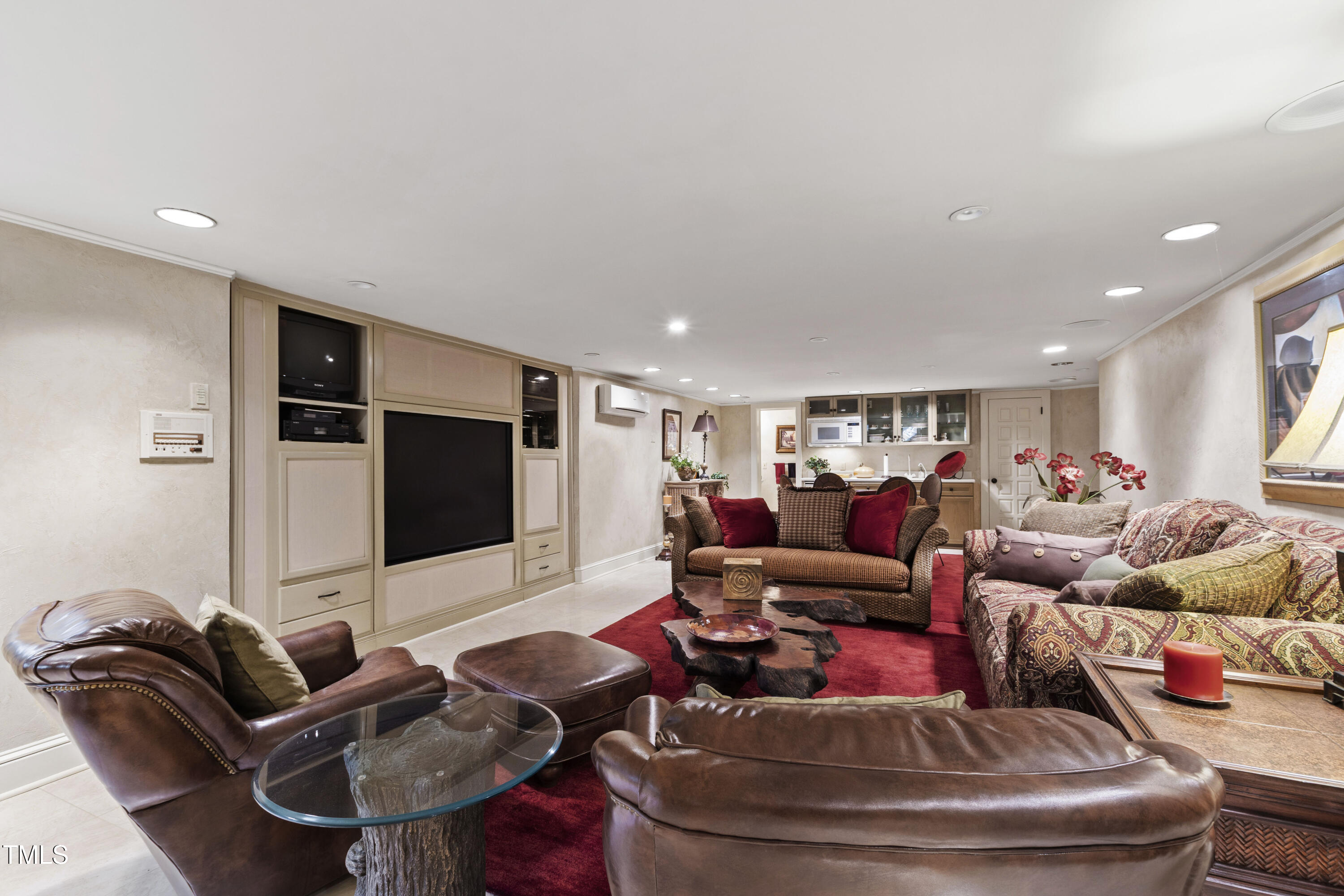 812 Kenmore Road Chapel Hill, NC 27514 - Photo 75 of 95 a living room with furniture and a flat screen tv