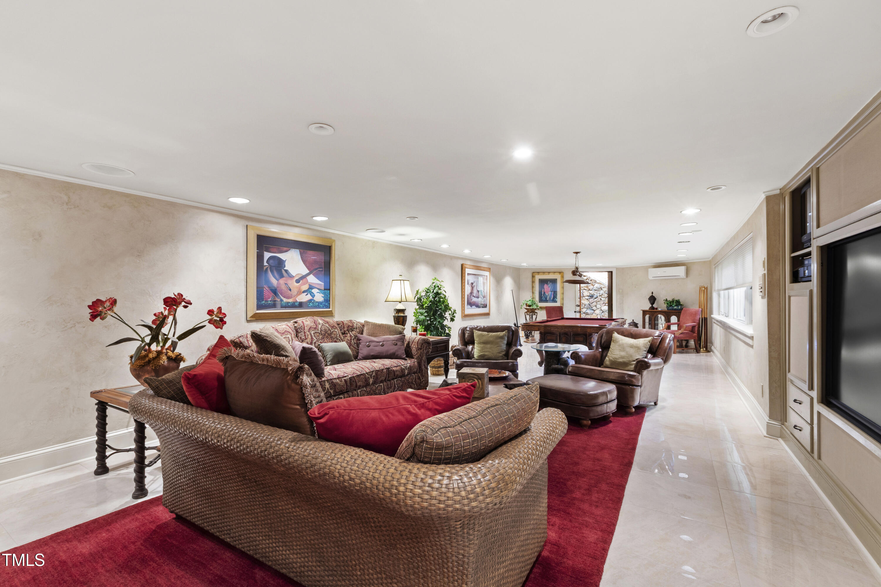 812 Kenmore Road Chapel Hill, NC 27514 - Photo 76 of 95 a living room with furniture and a flat screen tv