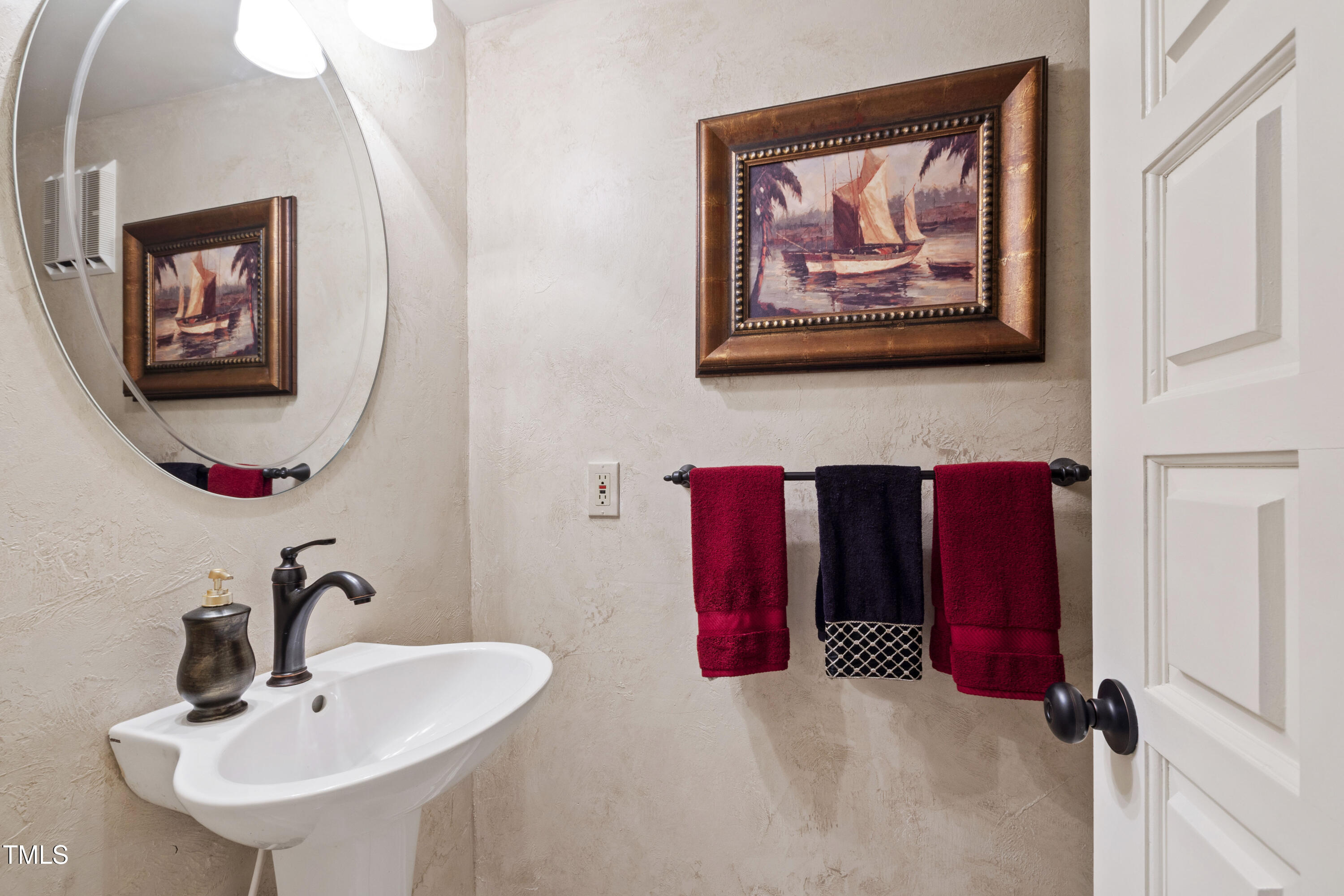 812 Kenmore Road Chapel Hill, NC 27514 - Photo 78 of 95 a bathroom with a sink and a mirror