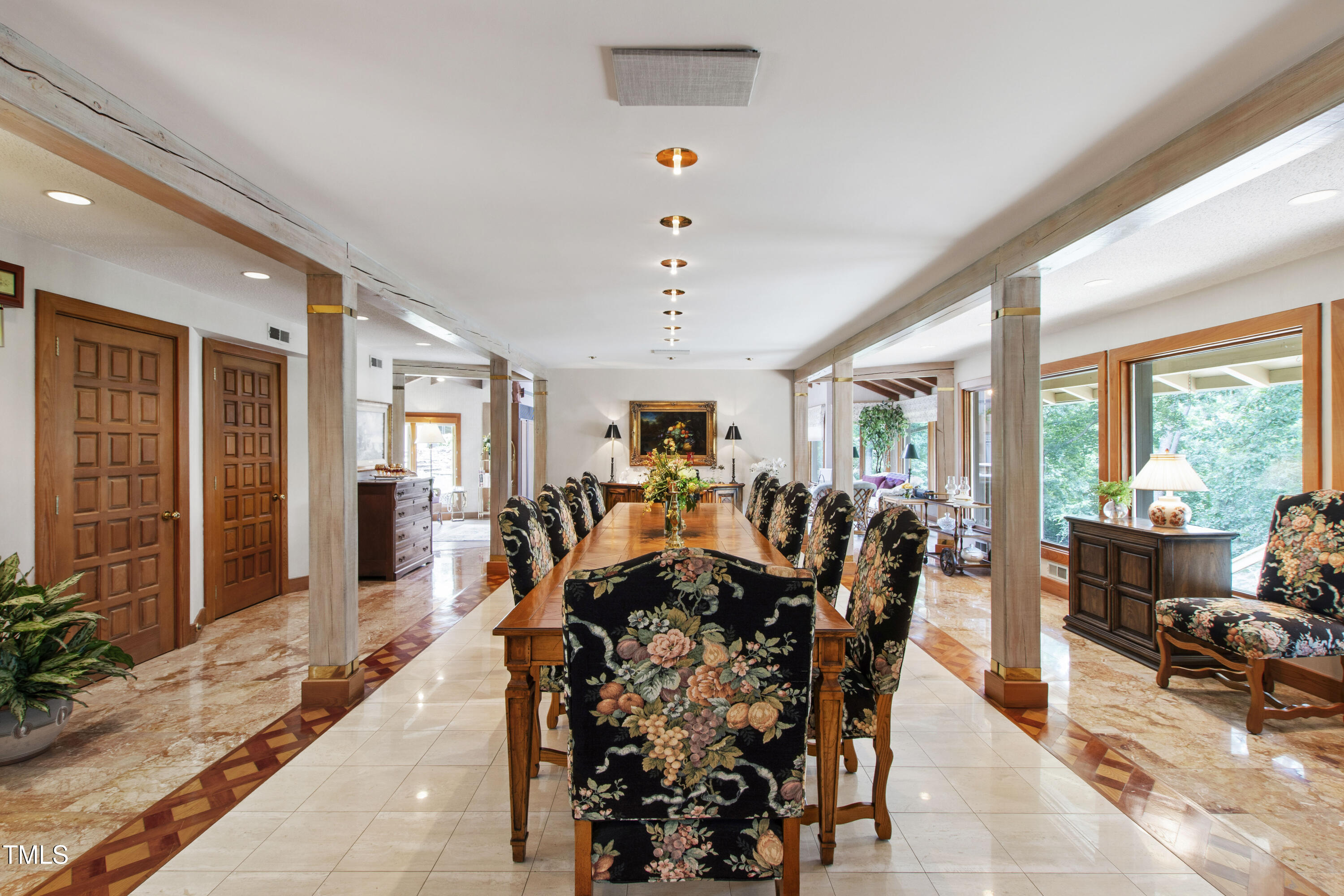 812 Kenmore Road Chapel Hill, NC 27514 - Photo 8 of 95 a view of a dining room with furniture window and outside view