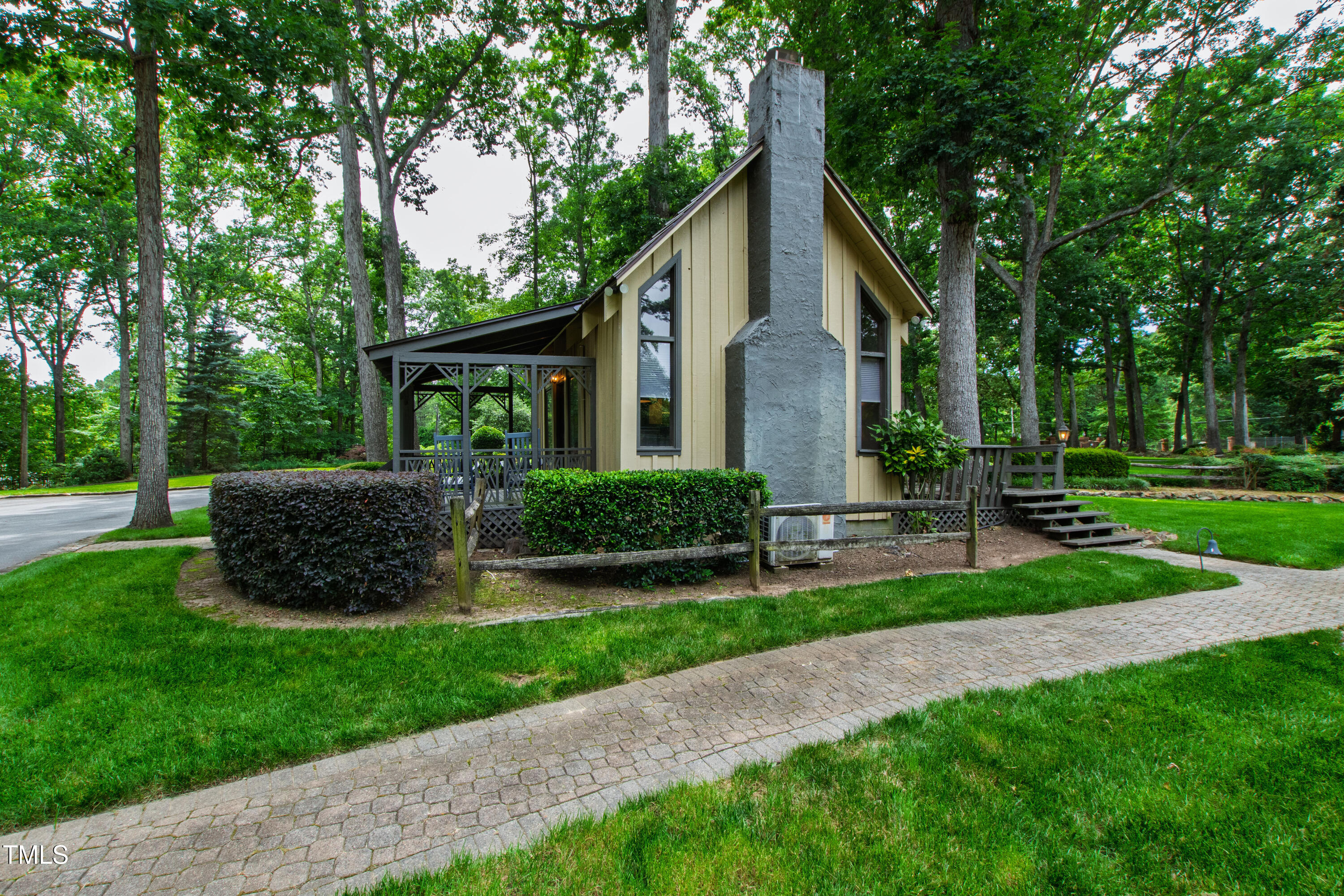 812 Kenmore Road Chapel Hill, NC 27514 - Photo 88 of 95 a front view of a house with a yard