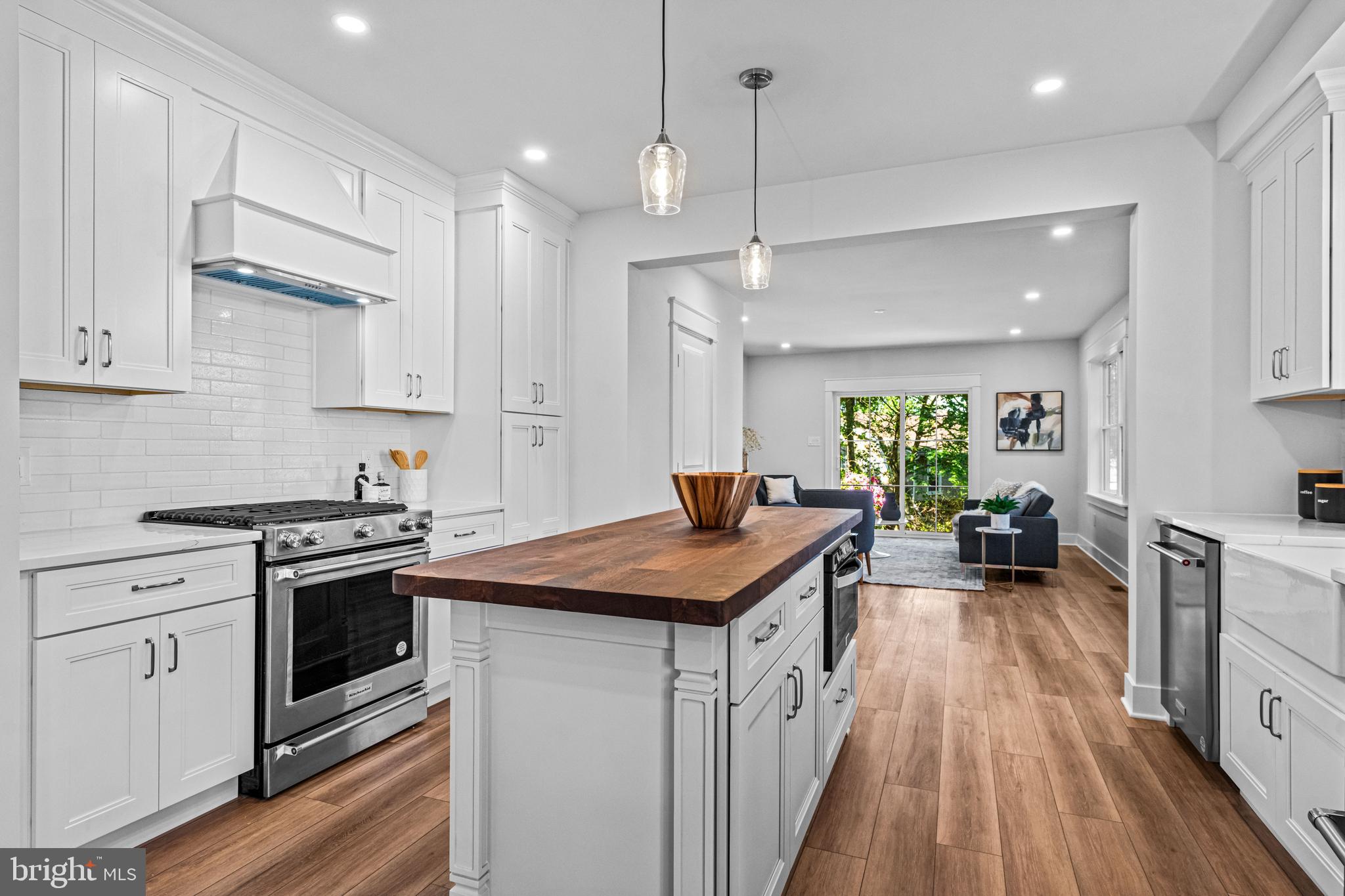 406 St Davids Avenue Wayne, PA 19087 - Photo 14 of 53 a kitchen with a stove sink and a refrigerator