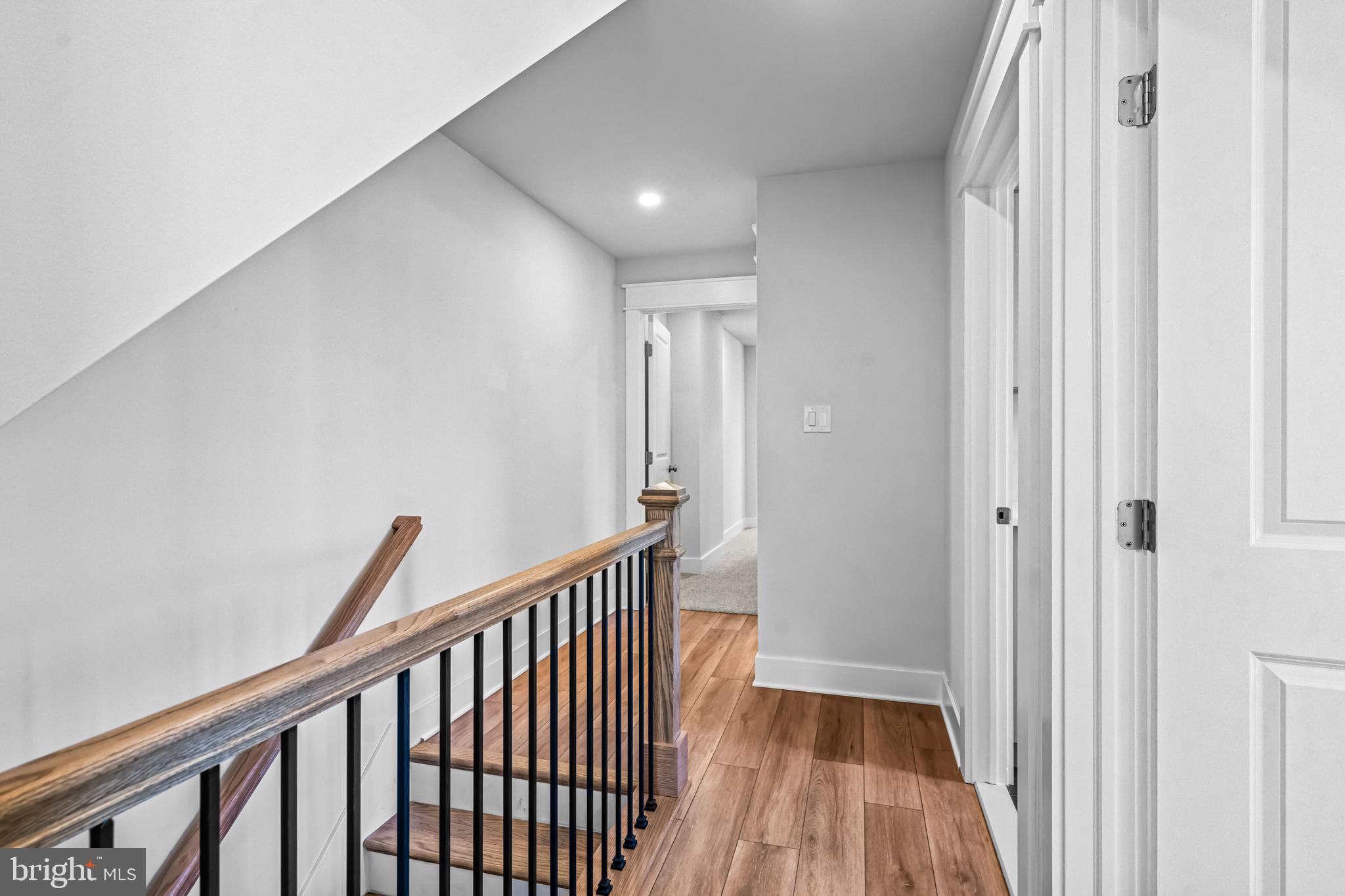 406 St Davids Avenue Wayne, PA 19087 - Photo 23 of 53 a view of a hallway with wooden floor and entryway