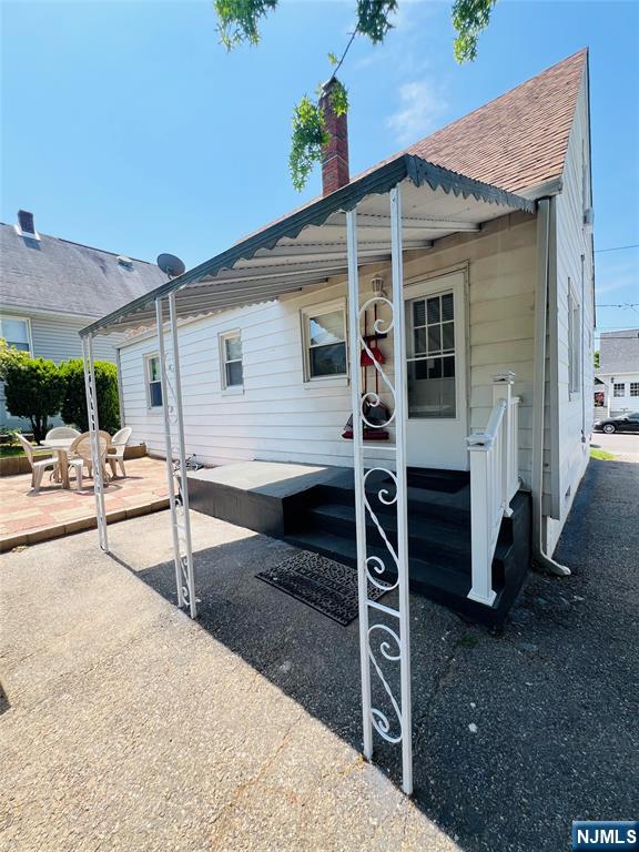 18 Pershing Street Garfield, NJ 07026 - Photo 5 of 16 a view of a house with a yard