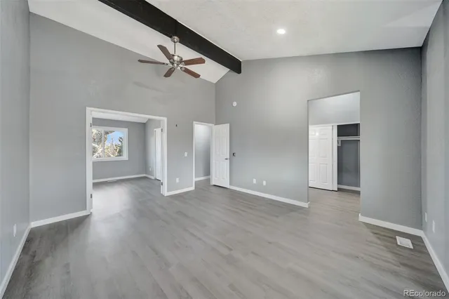 a bathroom with a bathtub and toilet