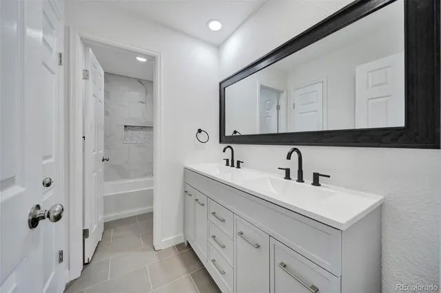a view of a room with wooden floor and window