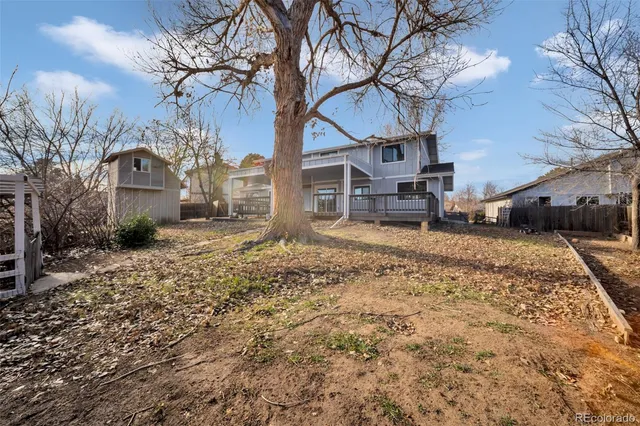 an aerial view of residential house with outdoor space