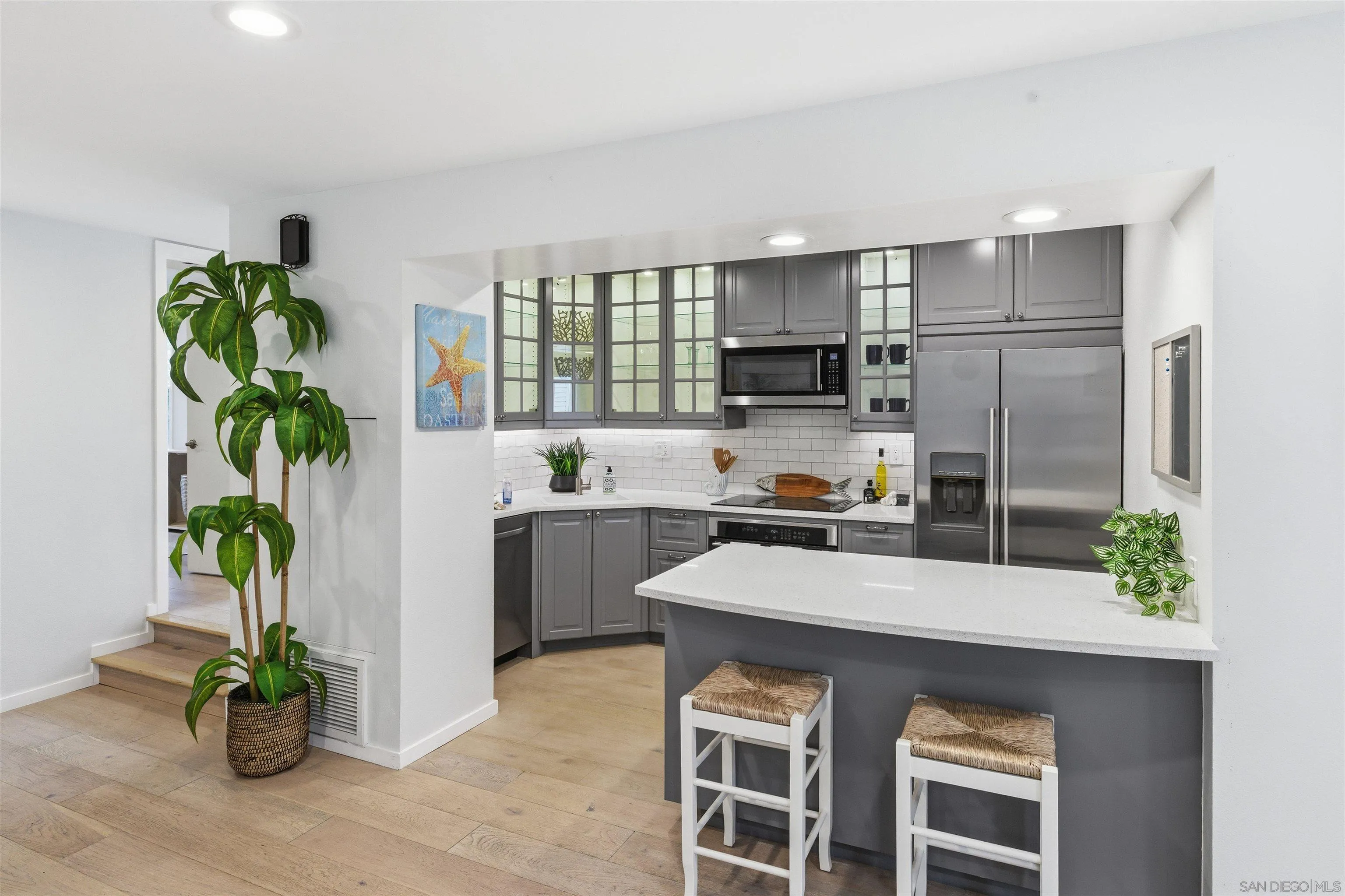 940 Sealane Drive, Unit 5 Encinitas, CA 92024 - Photo 6 of 48 a kitchen with refrigerator and a counter