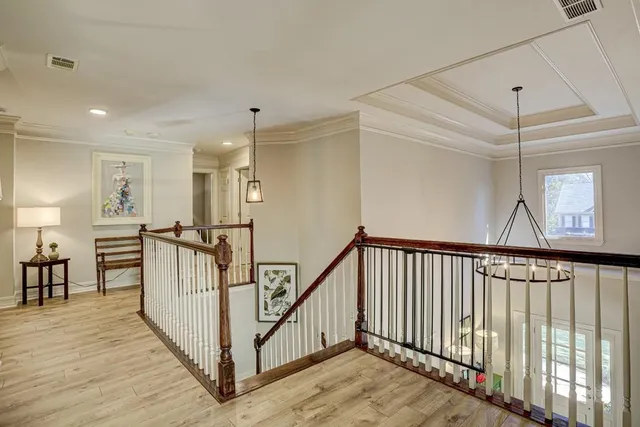 a bathroom with a tub a sink and mirrors