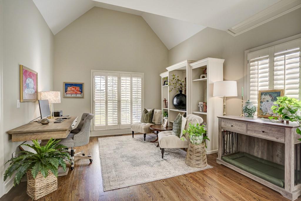 3805 Pennington Road Cumming, GA 30041 - Photo 6 of 63 a living room with furniture fireplace and potted plants