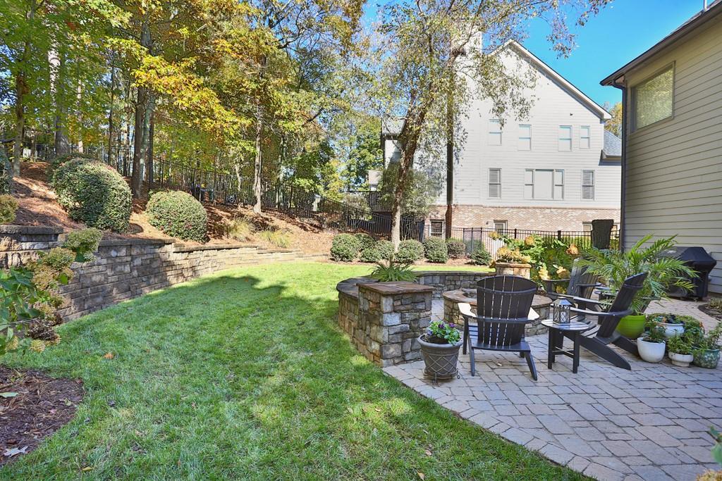 3805 Pennington Road Cumming, GA 30041 - Photo 62 of 63 a view of backyard with seating area and green space