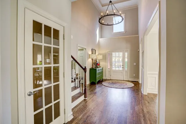 a bathroom with a toilet a sink and a mirror