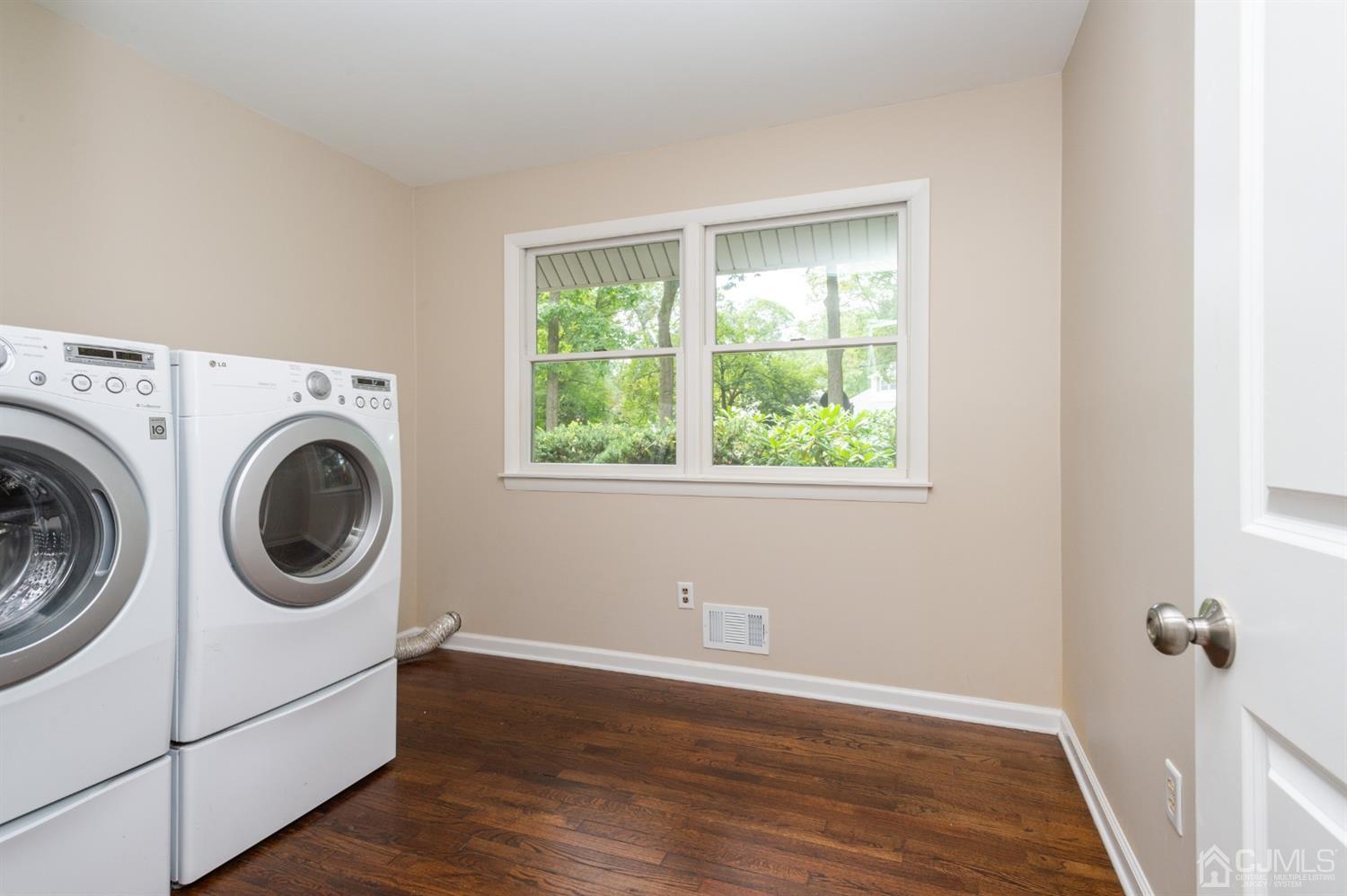 20 Donald Road East Brunswick, NJ 08816 - Photo 23 of 28 a utility room with dryer and washer