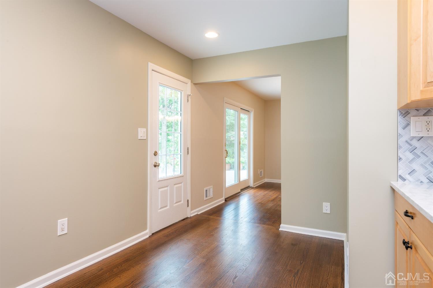 20 Donald Road East Brunswick, NJ 08816 - Photo 10 of 28 a view of an empty room with a window and wooden floor