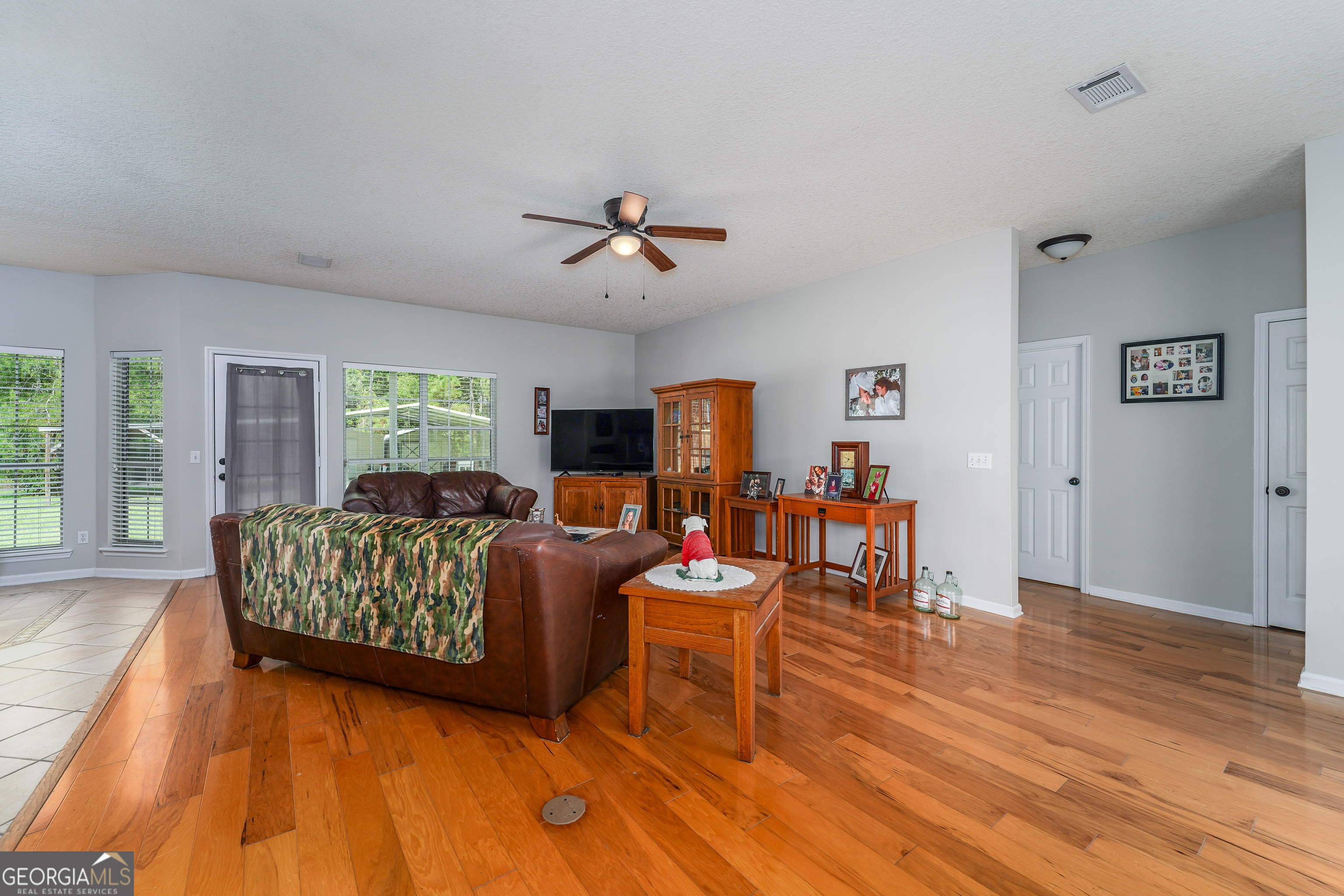 400 Smith Road Waycross, GA 31503 - Photo 15 of 25 a living room with furniture and a wooden floor