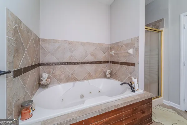 a bathroom with a sink double vanity and a mirror