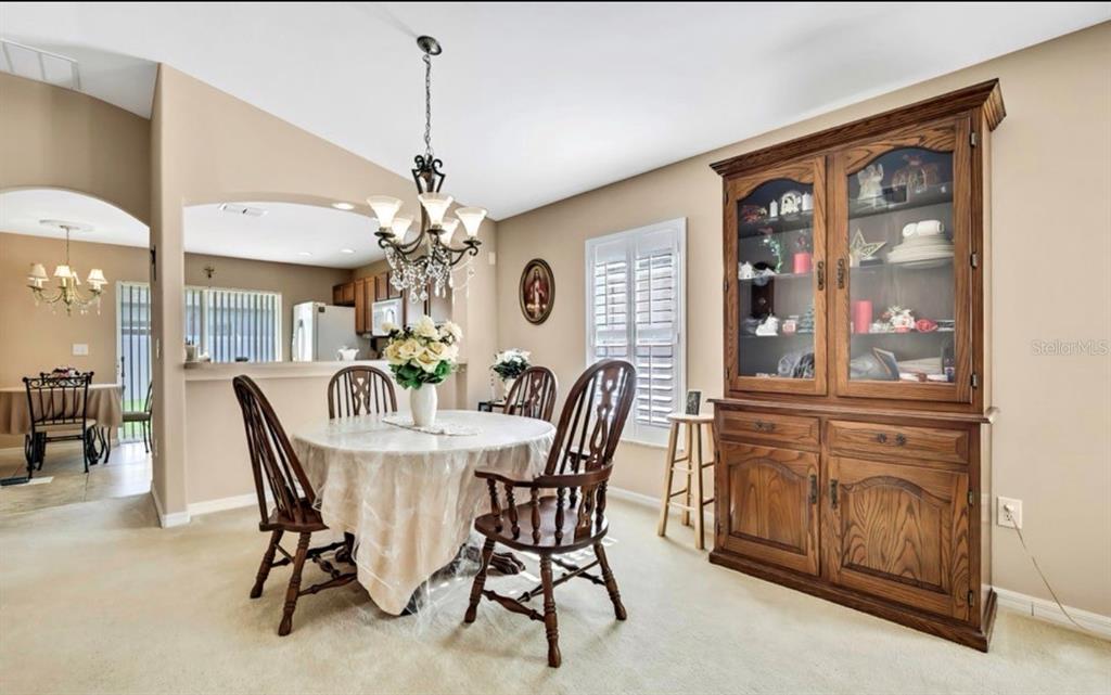 209 Winthrop Drive Spring Hill, FL 34609 - Photo 7 of 27 a dining room with furniture and window