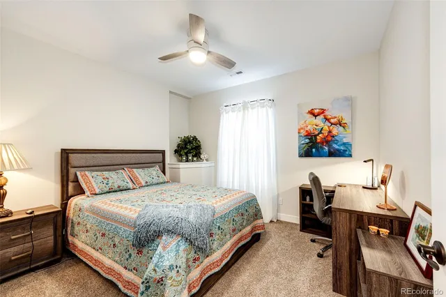 a bedroom with a bed and a closet