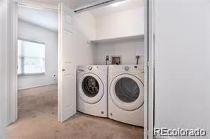 a kitchen with stainless steel appliances a stove a sink and a microwave