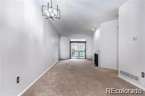 a view of a room that has a door