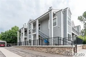 a tall building sitting on the side of a street