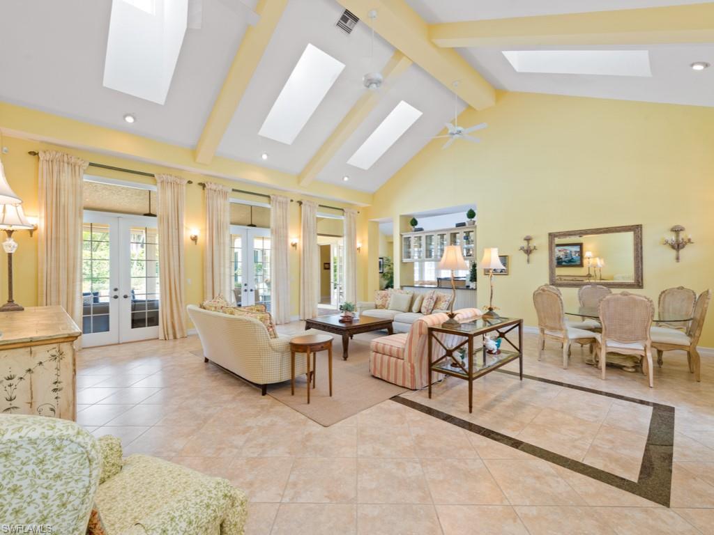 505 Harbour Drive Naples, FL 34103 - Photo 20 of 37 a living room with furniture and a large window