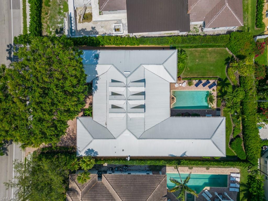 505 Harbour Drive Naples, FL 34103 - Photo 30 of 37 an aerial view of a house with a yard and large tree