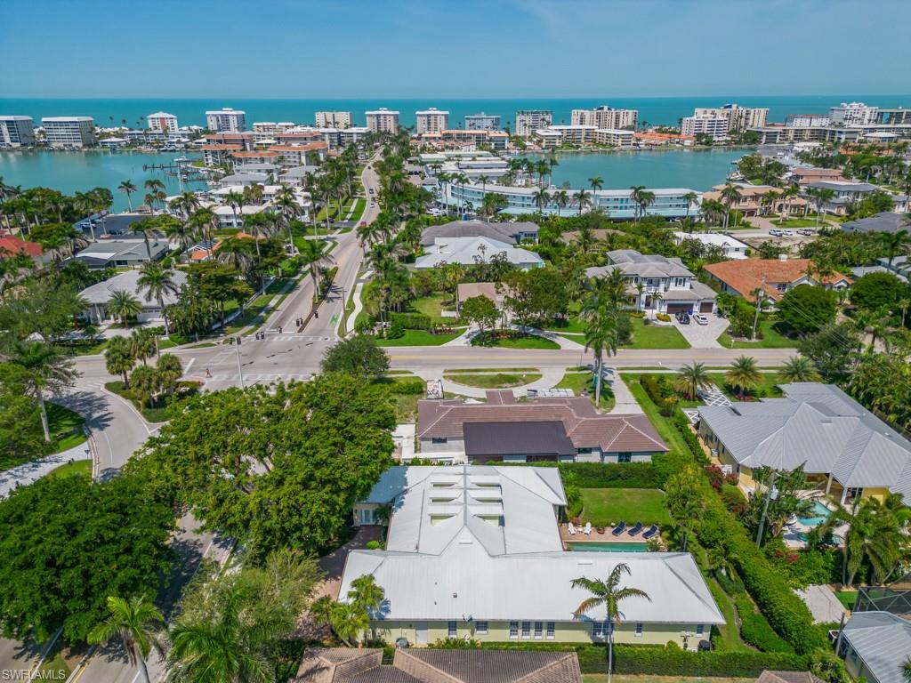 505 Harbour Drive Naples, FL 34103 - Photo 33 of 37 an aerial view of residential houses with outdoor space