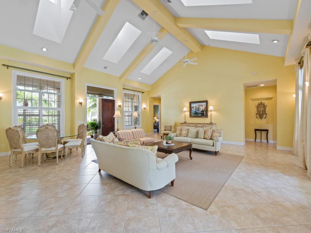 505 Harbour Drive Naples, FL 34103 - Photo 7 of 37 a living room with furniture and a large window