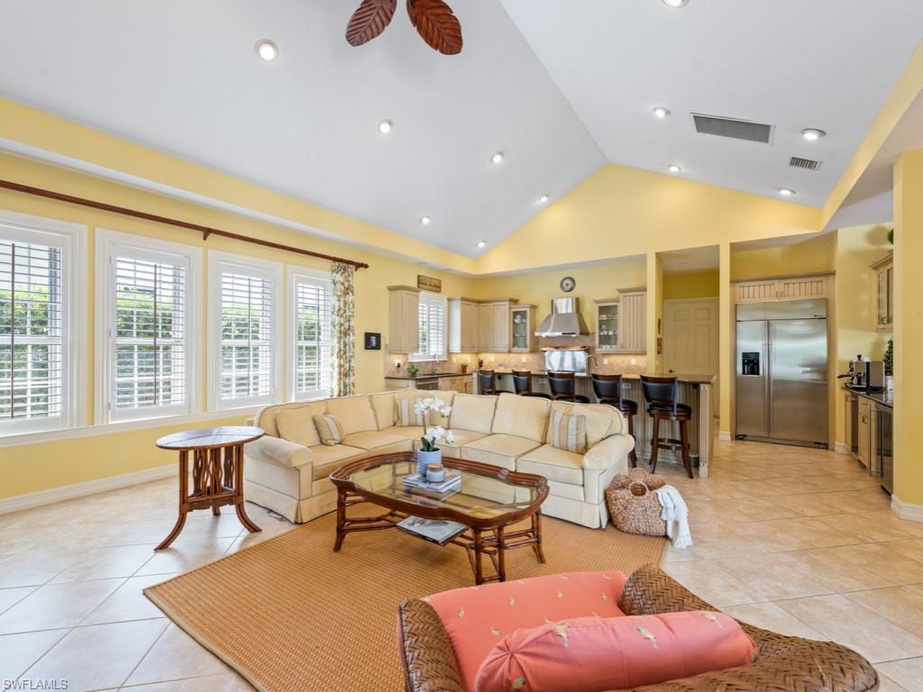 505 Harbour Drive Naples, FL 34103 - Photo 9 of 37 a living room with furniture and a table