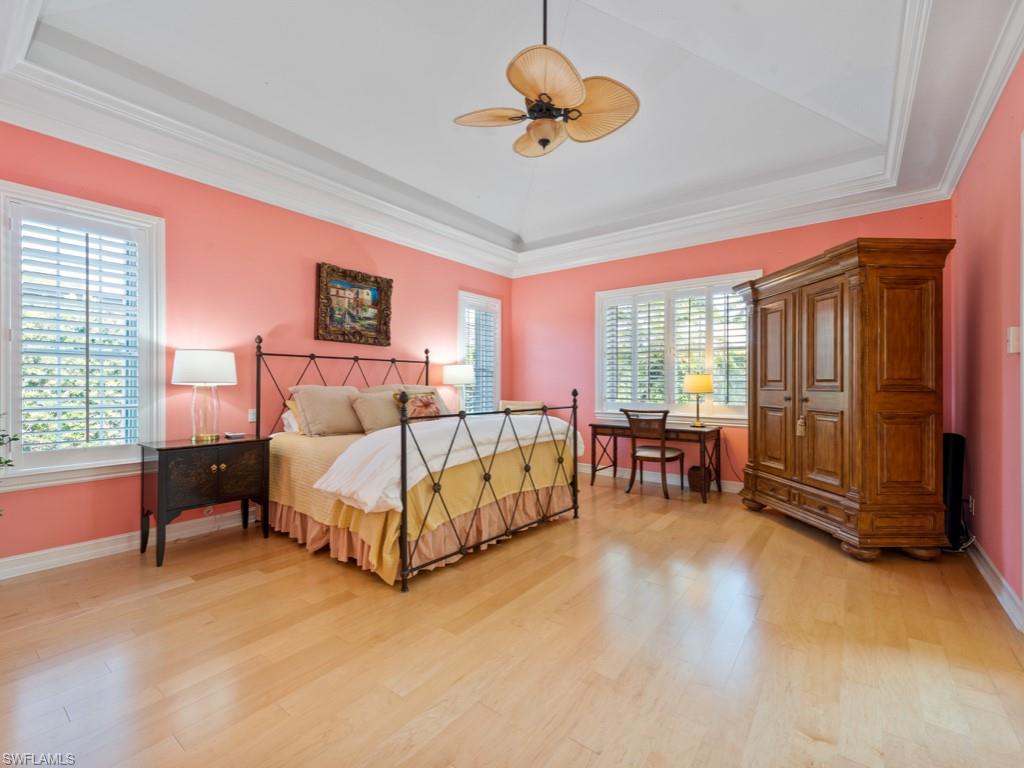 505 Harbour Drive Naples, FL 34103 - Photo 10 of 37 a bed room with a bed and a chair