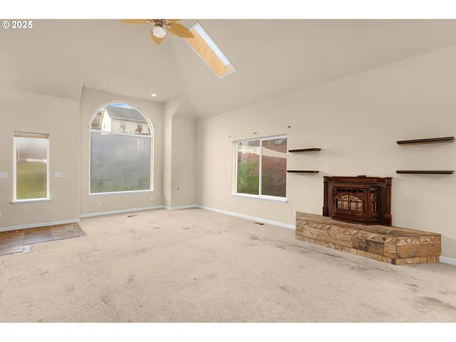 a view of an empty room and window